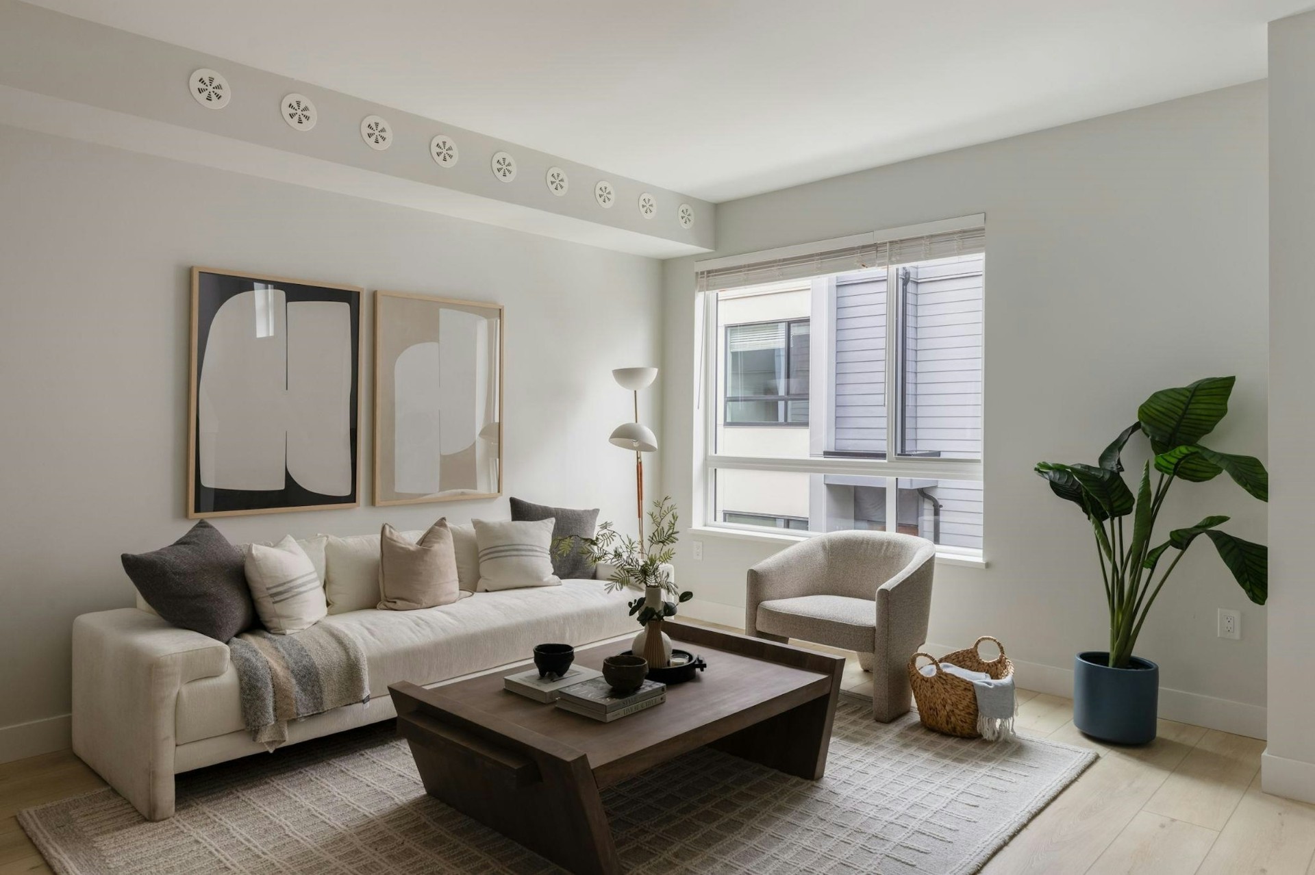 Staged living room with curated art and natural light