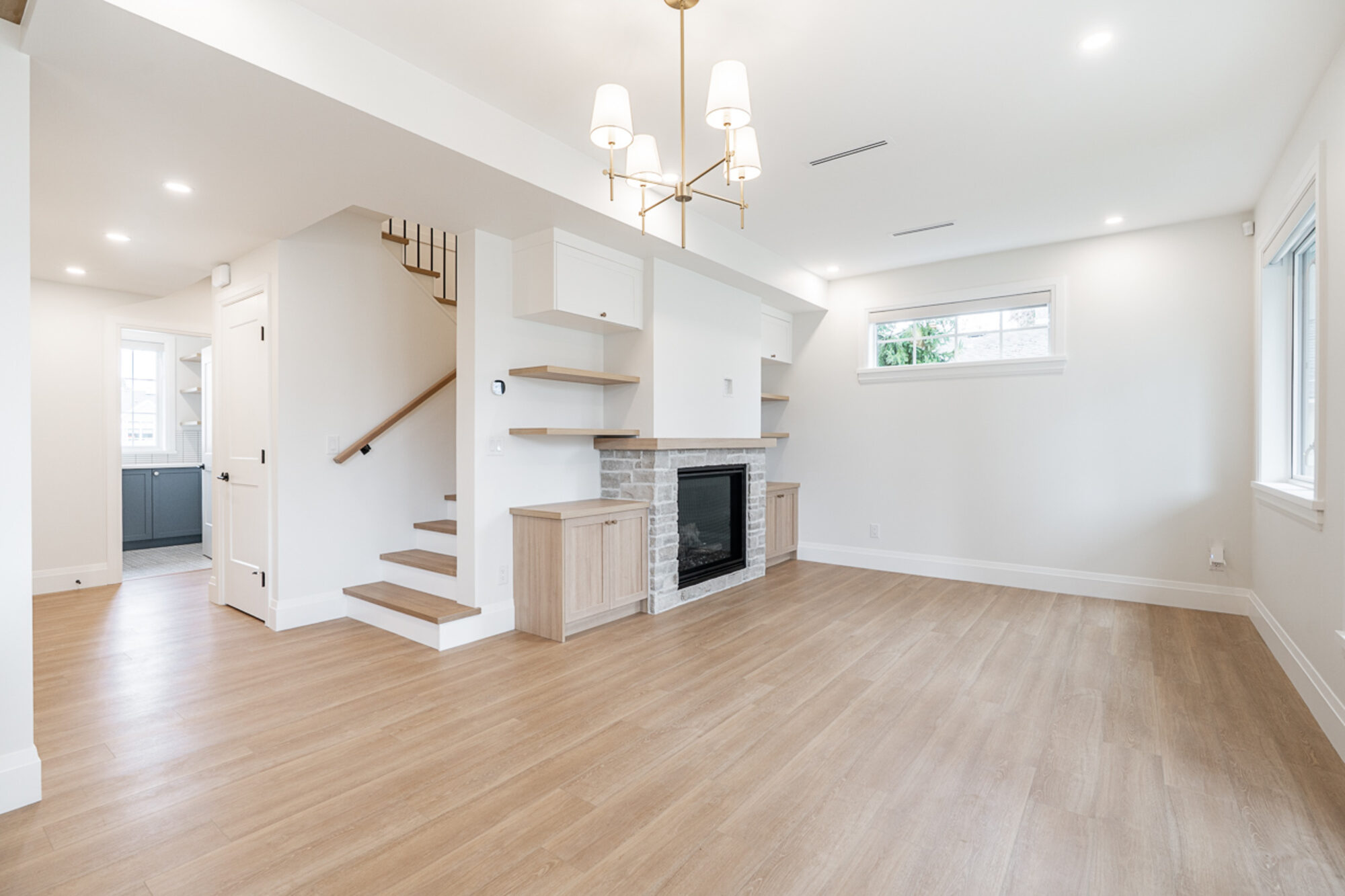 Crescent – Estate living room with fireplace and built-ins