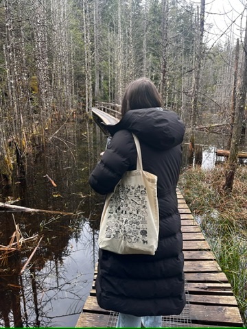 Rachael on a forest boardwalk